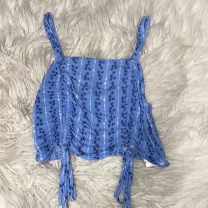 Isabelle’s cabinet blue floral tank top